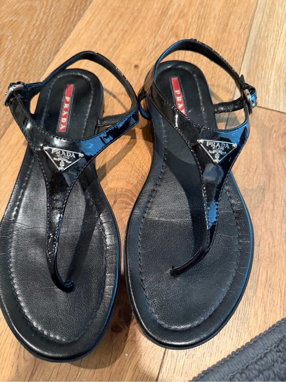 Prada Black Patent Leather Thong Sandals with Logo Plaque